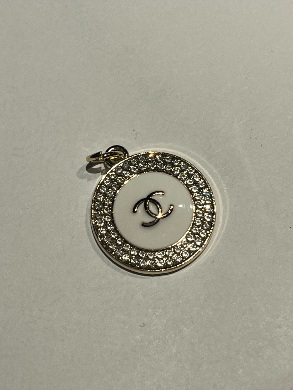 White Enamel & Gold Crystal Round Pendant Necklace with CC logo